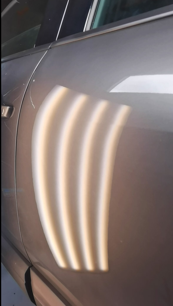 Результат беспокрасочного удаления вмятины